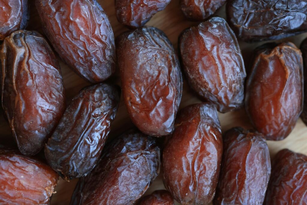 High-quality close-up image of organic dried dates showcasing texture and detail.