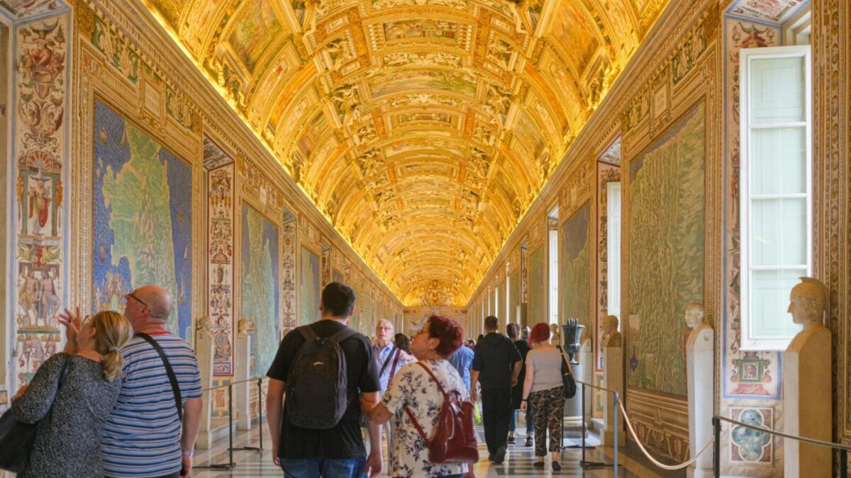 Explore the ornate and golden ceilings of the Vatican Museums filled with art and history.