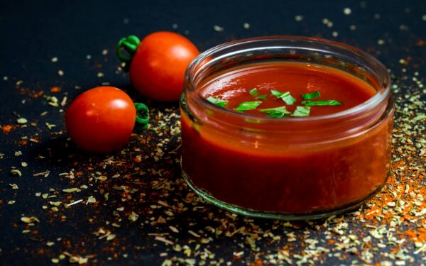 tomato and tomato puree with parsley in bowl