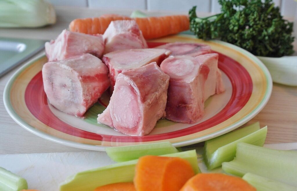 bone, soup bones, soup, carrots, leek, having lunch, food, soups, warm, vegetables, broth, plate, celery, soup bones, broth, broth, broth, broth, broth