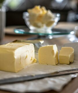 sliced cheese on clear glass plate