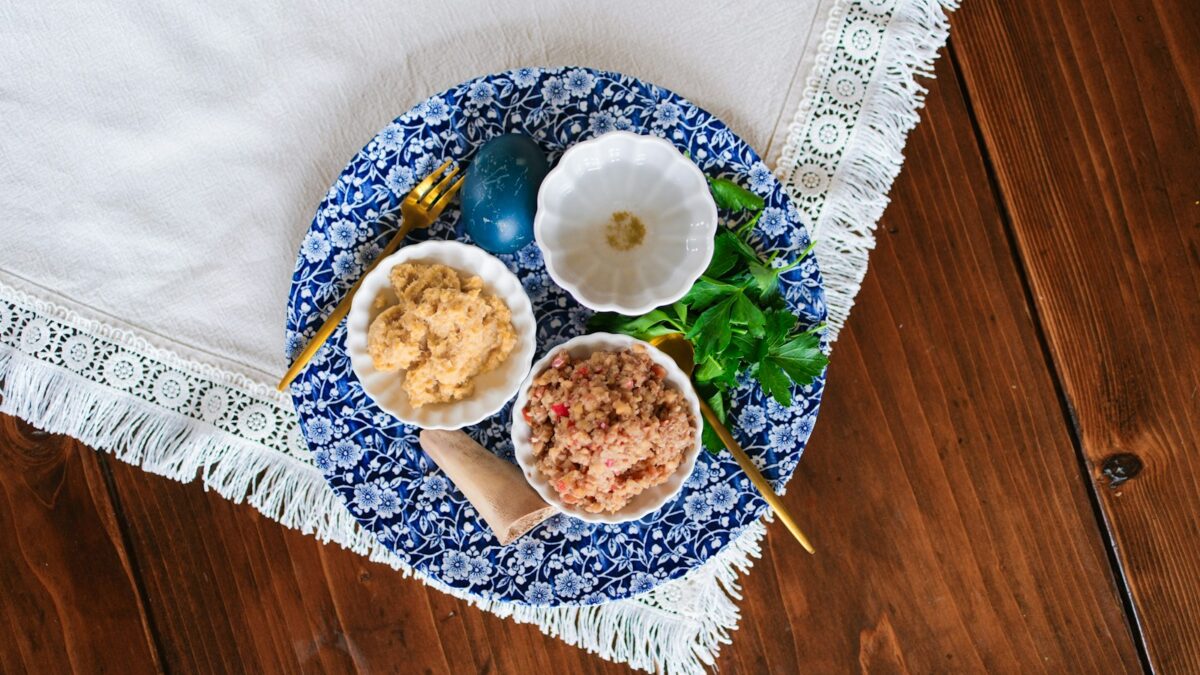 Easter eggs and dips on a decorative plate