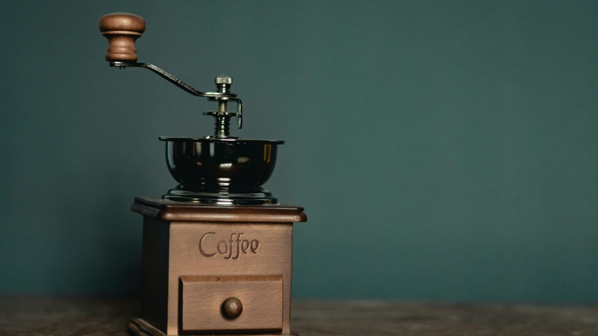 brown and black coffee grinder