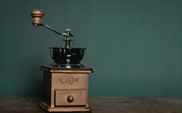 brown and black coffee grinder