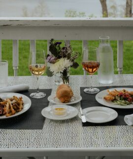 a table that has plates of food on it