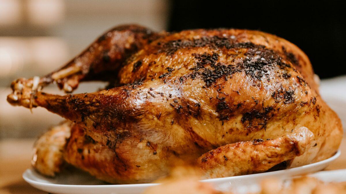 roasted chicken on white ceramic plate