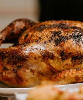 roasted chicken on white ceramic plate