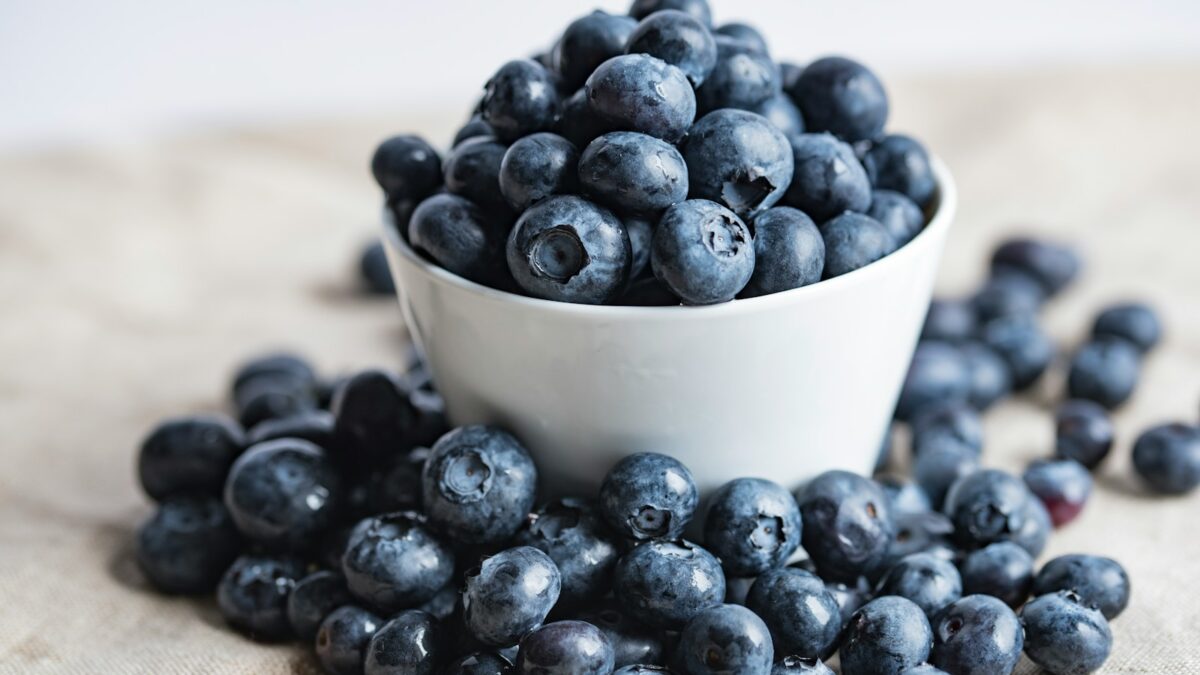 blueberries on white ceramic container