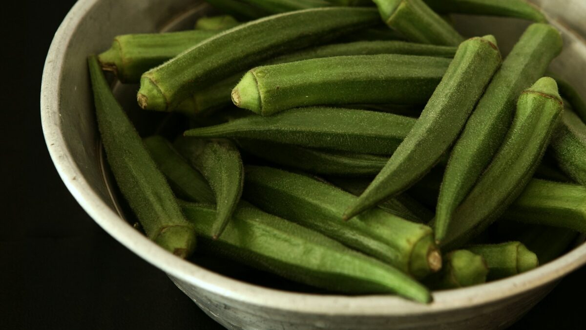 Okra vegetable in white bowl