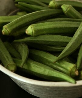 Okra vegetable in white bowl