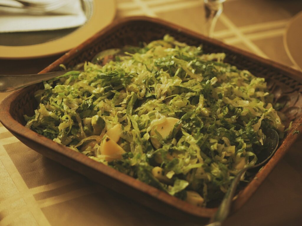 a bowl of food on a table with a fork