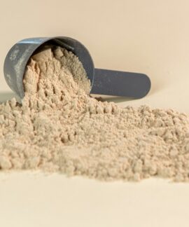 a scoop of powder sitting on top of a table