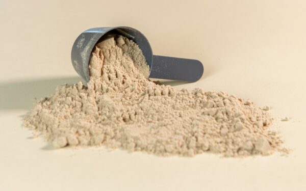 a scoop of powder sitting on top of a table