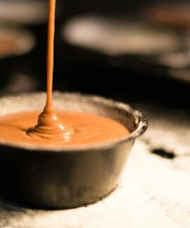 brown liquid in white ceramic cup
