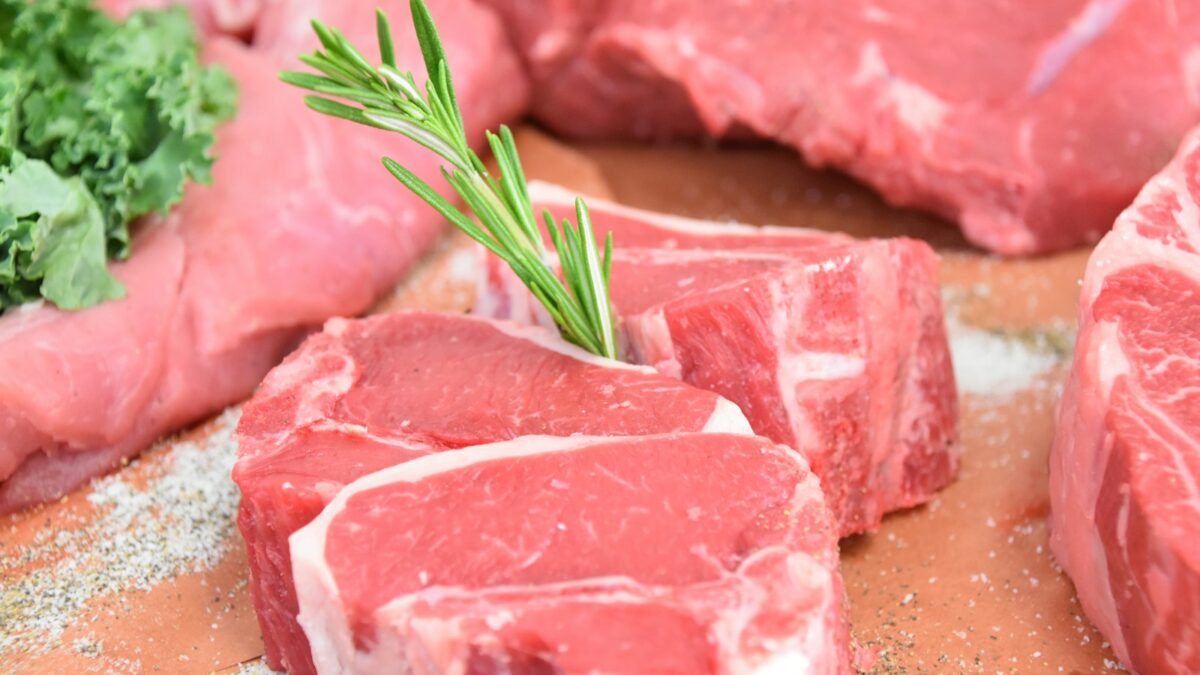 raw meat with green leaves