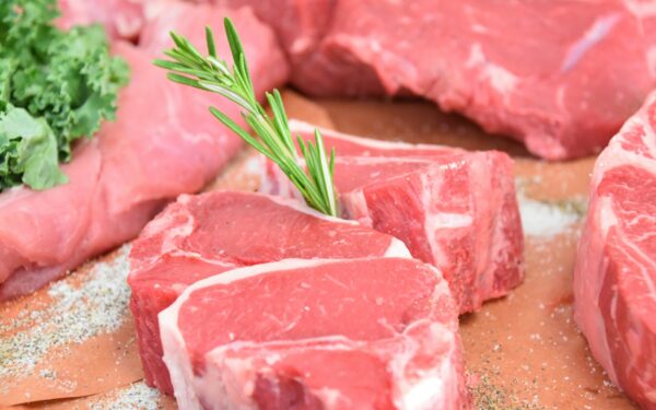 raw meat with green leaves