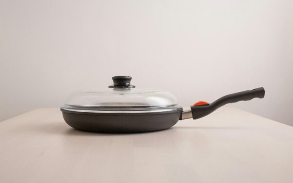 a pan with a lid on a table