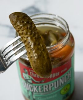 stainless steel fork on green labeled can