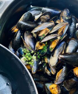 black fish on black round container