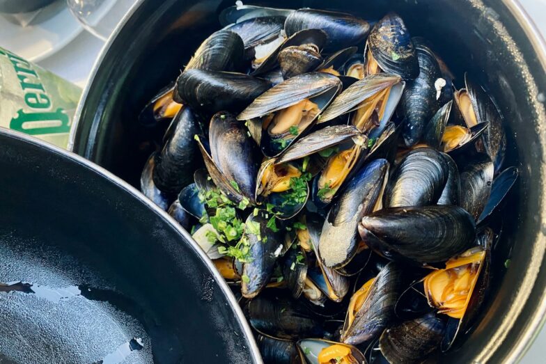 black fish on black round container