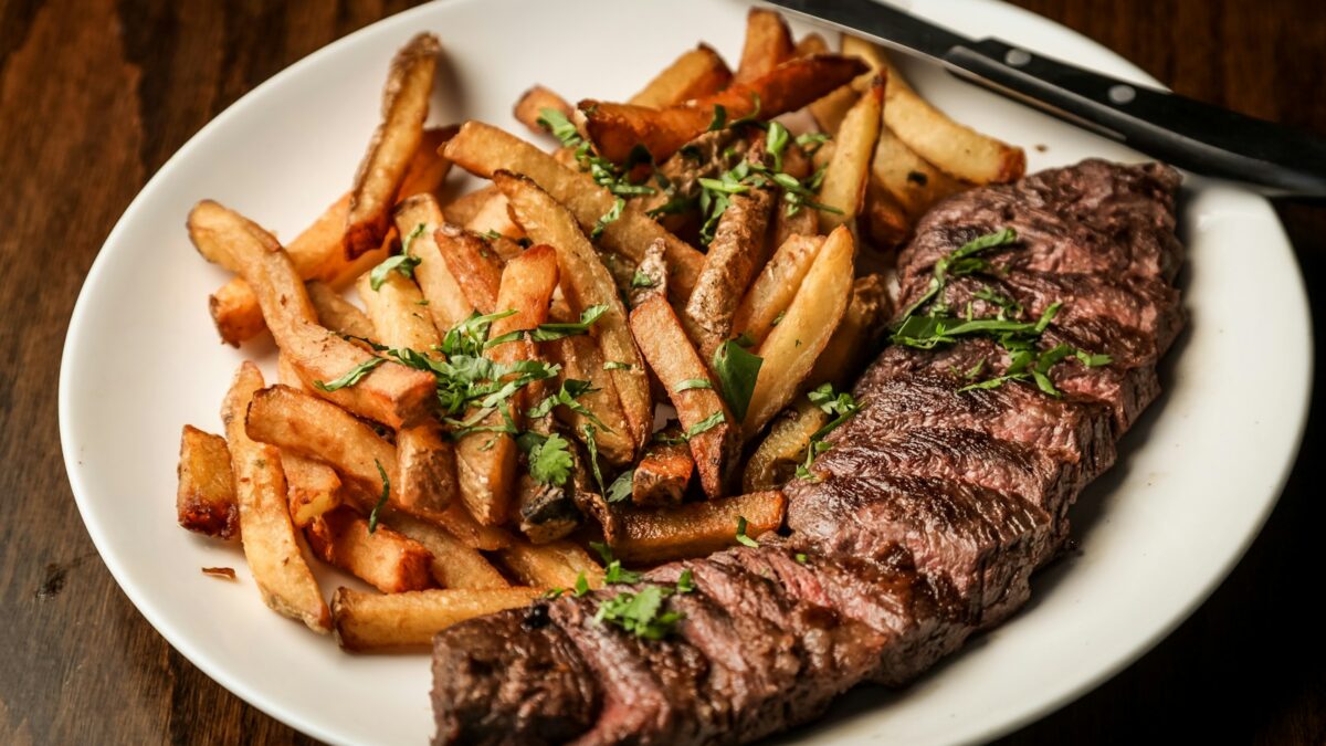 grilled meat on white ceramic plate