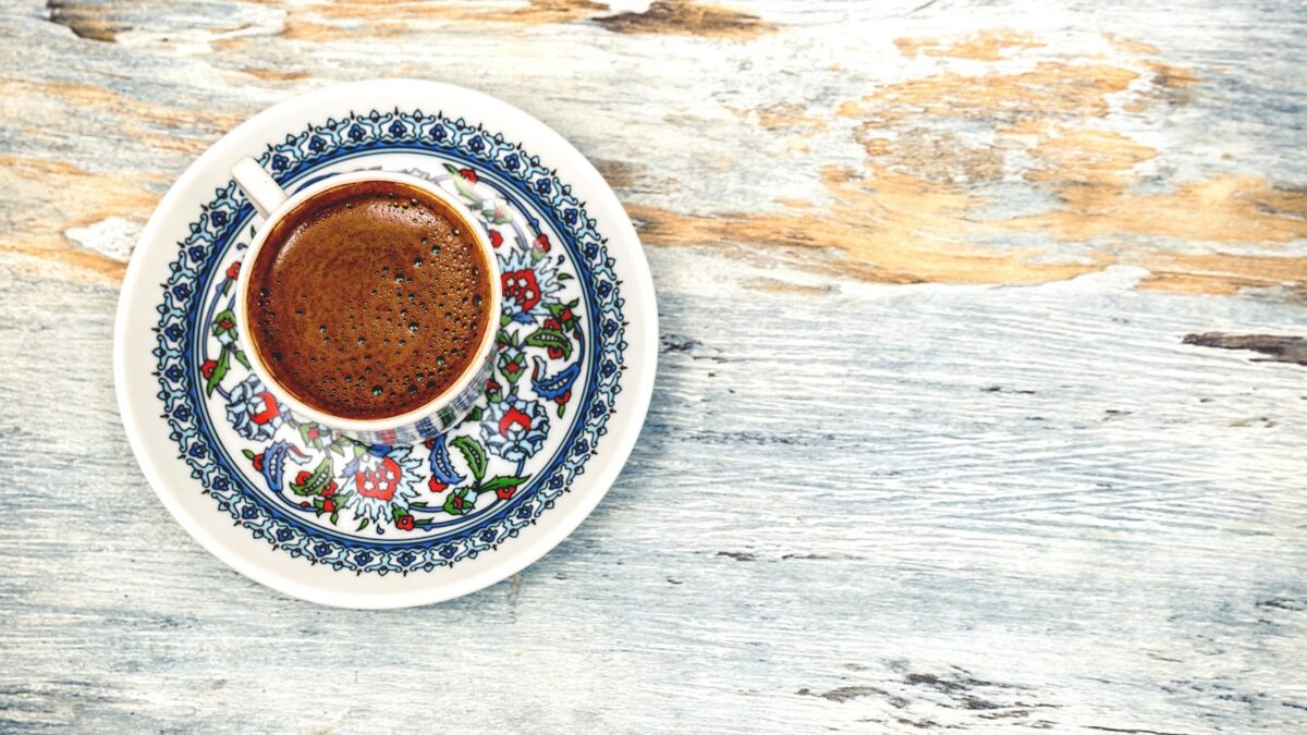 flat lay photography of cup filled with coffee