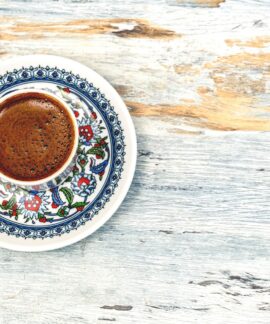 flat lay photography of cup filled with coffee