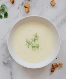 white ceramic bowl with green liquid
