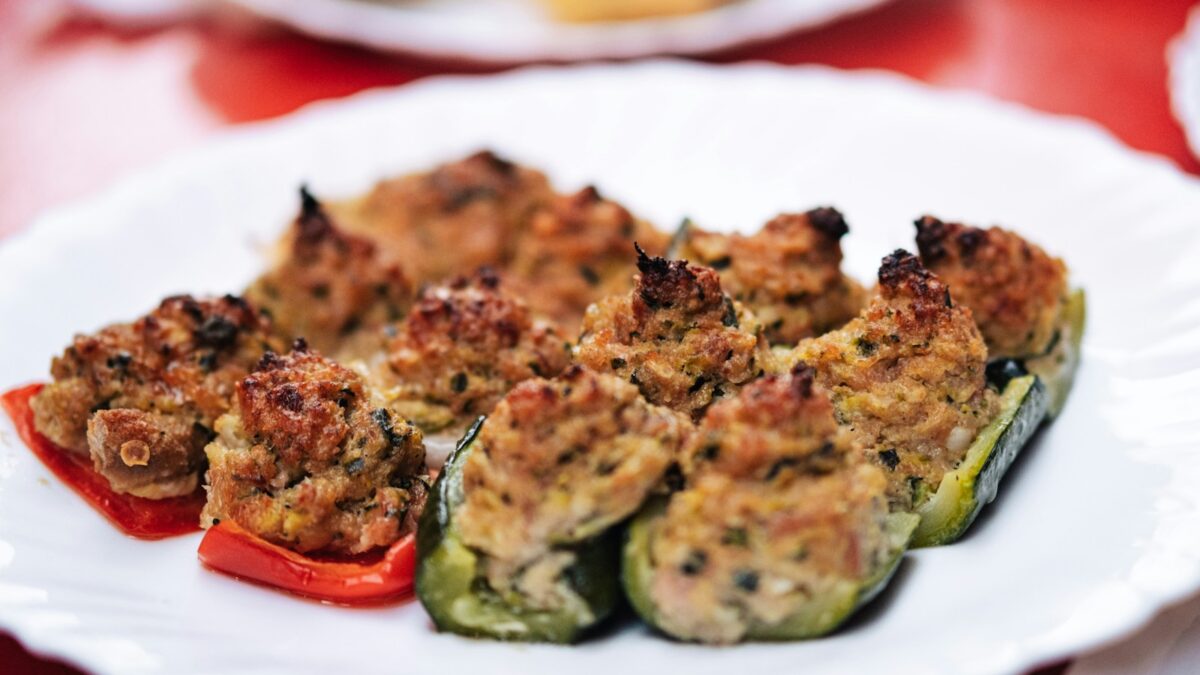 a plate of stuffed peppers on a table