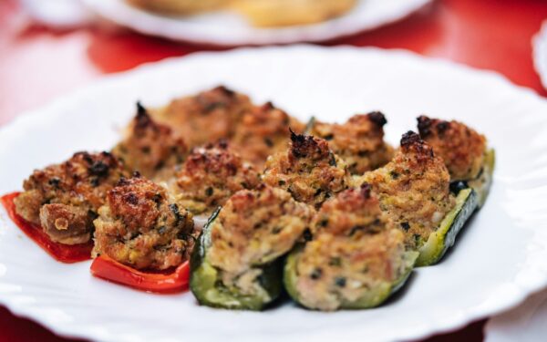 a plate of stuffed peppers on a table