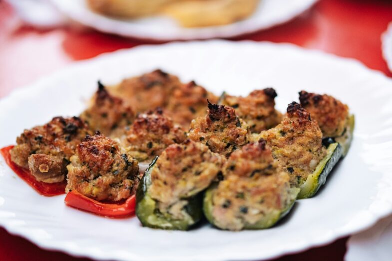 a plate of stuffed peppers on a table