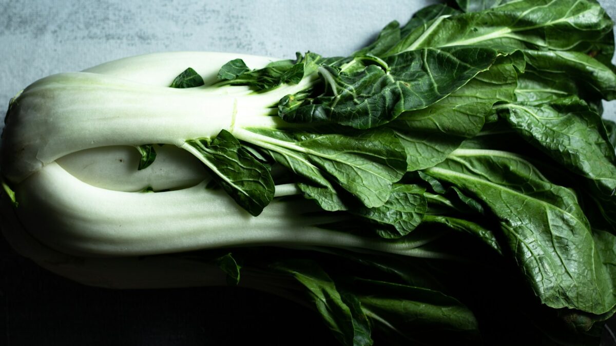 green vegetable on white ceramic plate