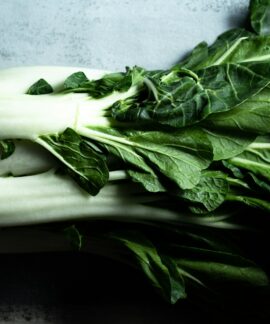 green vegetable on white ceramic plate