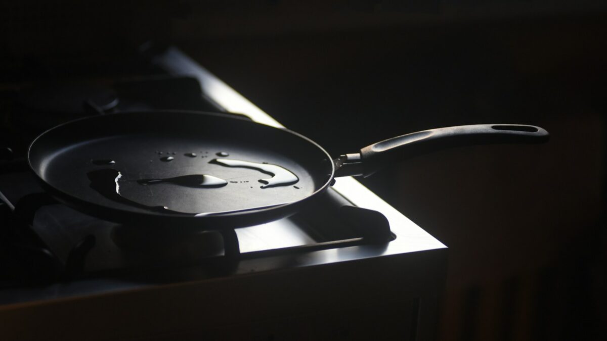 a frying pan sitting on top of a stove