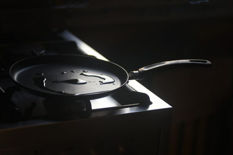 a frying pan sitting on top of a stove